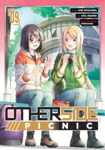 Two women sit on a bench outside a dilapidated building, eating. The blonde holds a rise ball in both hands one of which is transparent, the brunette with one blue eye and one brown eye holds a sandwich, as she speaks animatedly, smiling.