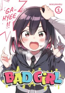 A dark haired girl wearing a blazer and tie with her mouth open and a shocked expression